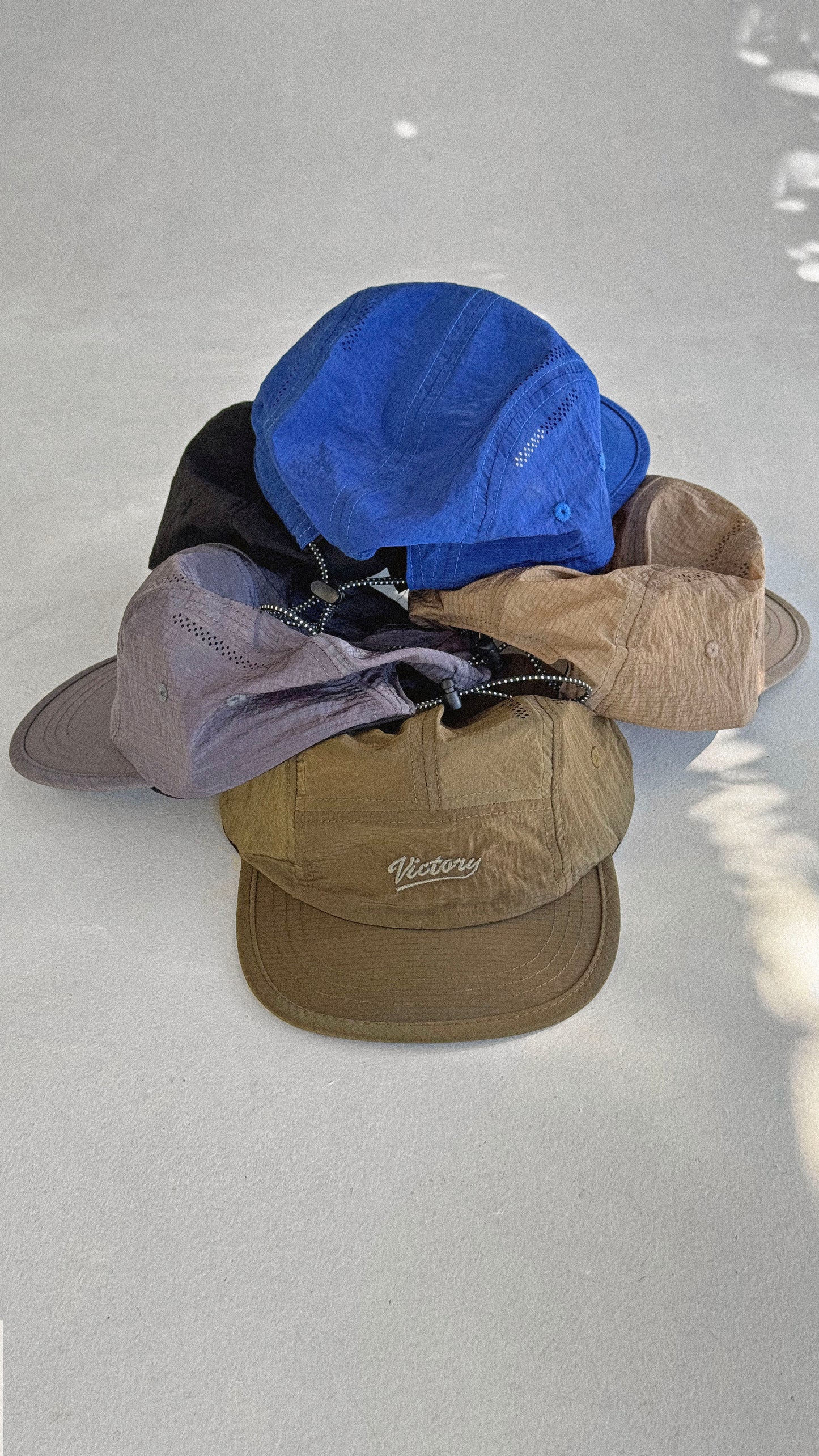 Player Sport Cap
Quick-dry nylon 5-panel sport cap, lightweight & breathable.
Shorter brim for maximum sun protection without blocking your vision.
Tonal embroidered logo at front. One size fits all with adjustable elastic drawstring fastener.