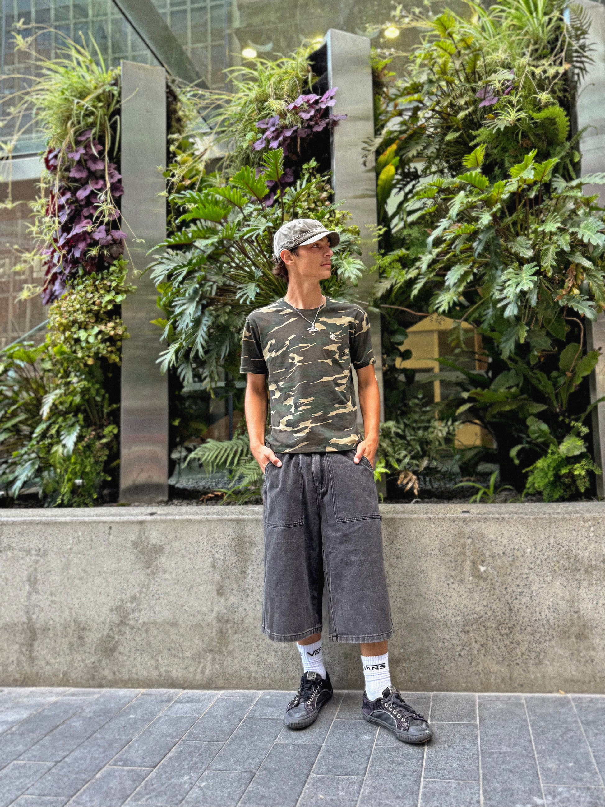 Unisex Camo Box Tee in Woodland and Black Camo, Box Fit with Shorter Body, 180 GSM Mid-Weight Cotton, Left Chest Logo Embroidery. Baggy Patch Pocket Jorts