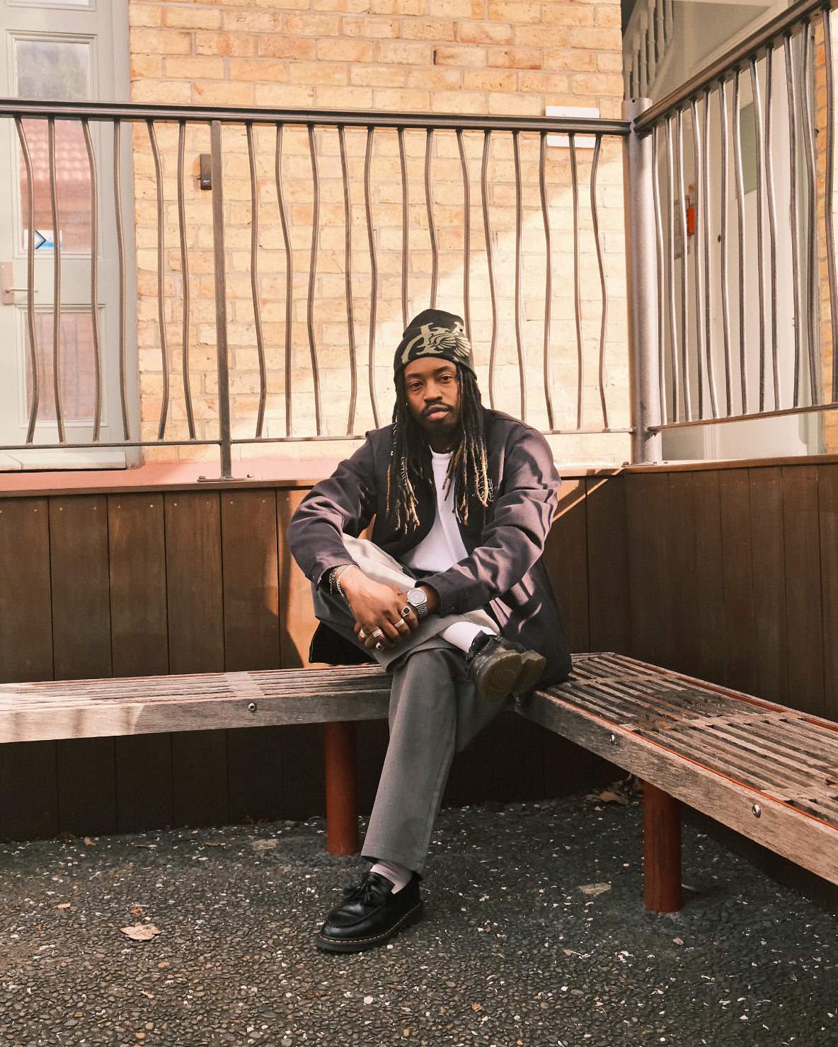 Iggy in the Wing Reversible Skull Beanie, Canvas Cord Collar Work Jacket, and Double Pleated Pants — a vintage-inspired streetwear workwear look, shot in Auckland, New Zealand.