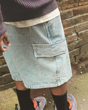 Premium quality cargo denim jean shorts by New Zealand skate and streetwear clothing label VIC Apparel. Loose fit. Featuring utility pockets and triple needle contrast stitching with VIC label flag at the back right pocket. Classic vintage workwear style. 90's baggy jorts style.