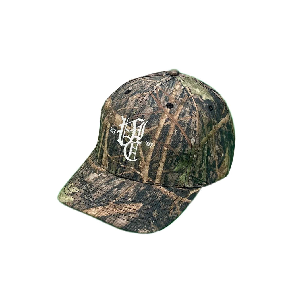  Discover the ultimate in outdoor style with our Realtree Camo 6-Panel Hat. Made from durable True Timber printed fabric, this structured hat features an embroidered logo for an authentic touch. With an adjustable fastener and one-size-fits-all design, it's perfect for any adventure. Embrace the wild in style with this functional and fashionable hat.
