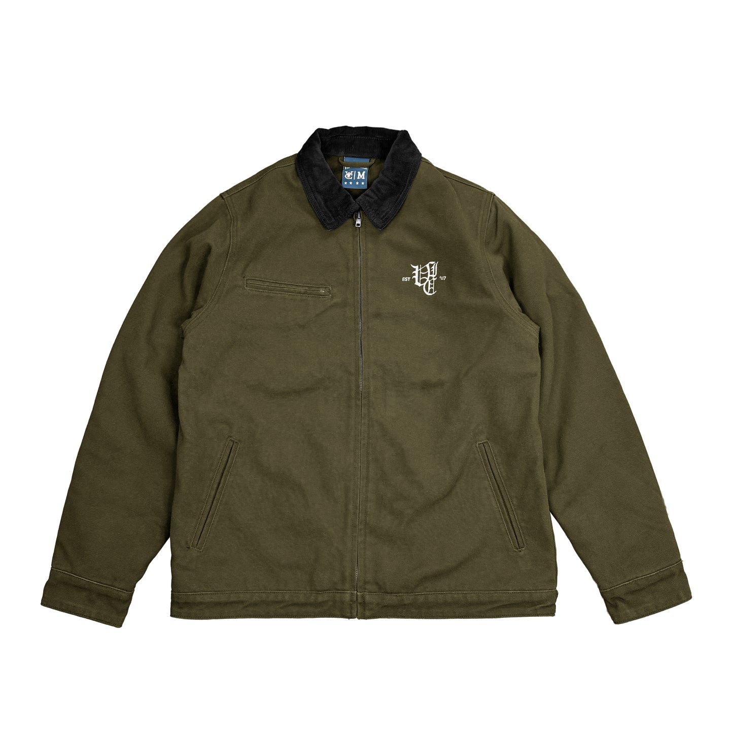 OL' ENGLISH CANVAS CORD COLLAR JACKET – A tough, heavyweight 470 GSM cotton duck canvas workwear jacket with a 16 wale corduroy collar, blanket lining, and adjustable fit. Inspired by vintage workwear. Built for durability with multiple pockets, YKK zip, and embroidered logo, it’s made to handle long days—whether on the job or out skating in the cold.