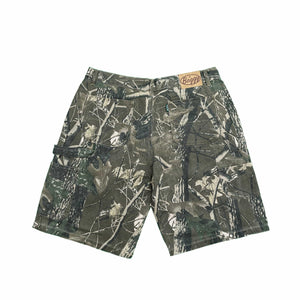 Explore the perfect blend of durability and style with our Realtree Camo Carpenter Shorts. Featuring a baggy fit, 100% cotton comfort, and YKK zip fly, these shorts are streetwear-ready. Complete with utility pockets, a hammer loop, and triple needle stitching for lasting quality. 