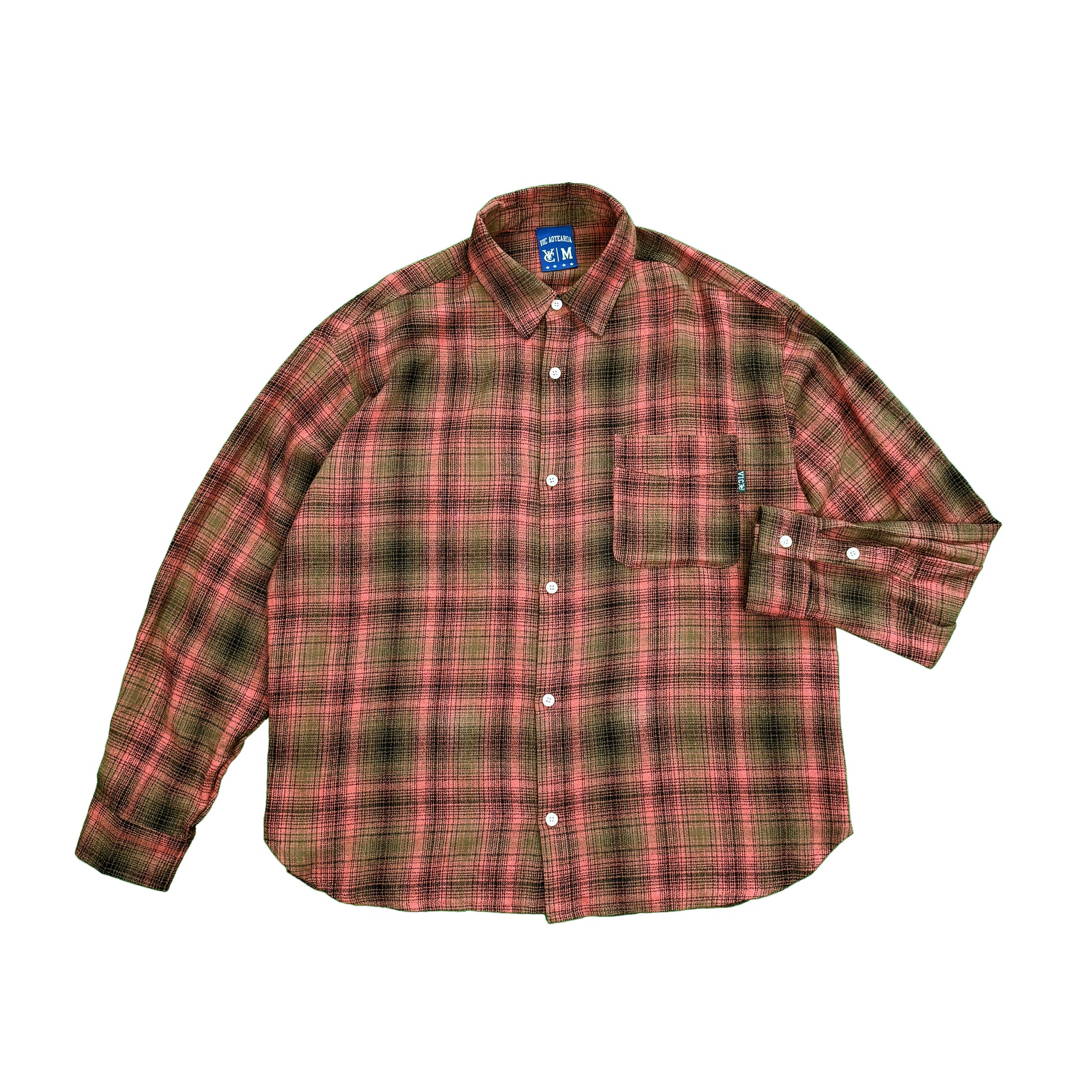 Elevate your casual wardrobe with the VIC Plaid Shirt. Made from 100% cotton, this shirt offers a relaxed box-fit and a soft-washed finish for ultimate comfort. The classic check pattern provides timeless style, while the distinctive VIC pip label detail on the chest pocket adds a unique touch. Whether you're dressing up for a weekend outing or down for a laid-back day, this plaid shirt is a versatile addition to your collection.