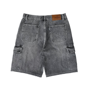 Premium quality cargo denim jean shorts by New Zealand skate and streetwear clothing label VIC Apparel. Loose fit. Featuring utility pockets and triple needle contrast stitching with VIC label flag at the back right pocket. Classic vintage workwear jorts style. 