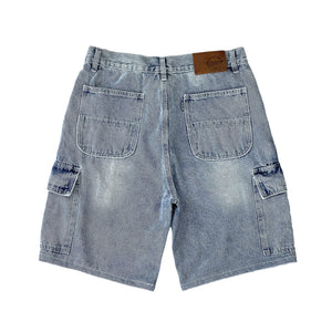 Premium quality cargo denim jean shorts by New Zealand skate and streetwear clothing label VIC Apparel. Loose fit. Featuring utility pockets and triple needle contrast stitching with VIC label flag at the back right pocket. Classic vintage workwear style. 