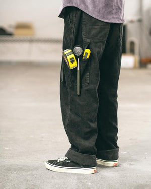 Premium quality corduroy carpenter pants by New Zealand skate and streetwear clothing label VIC Apparel. Baggy fit. Featuring utility pockets, a traditional hammer loop, and triple needle contrast stitching with VIC label flag at the back right pocket. The 80s & 90s Classic vintage workwear cord work pant style.