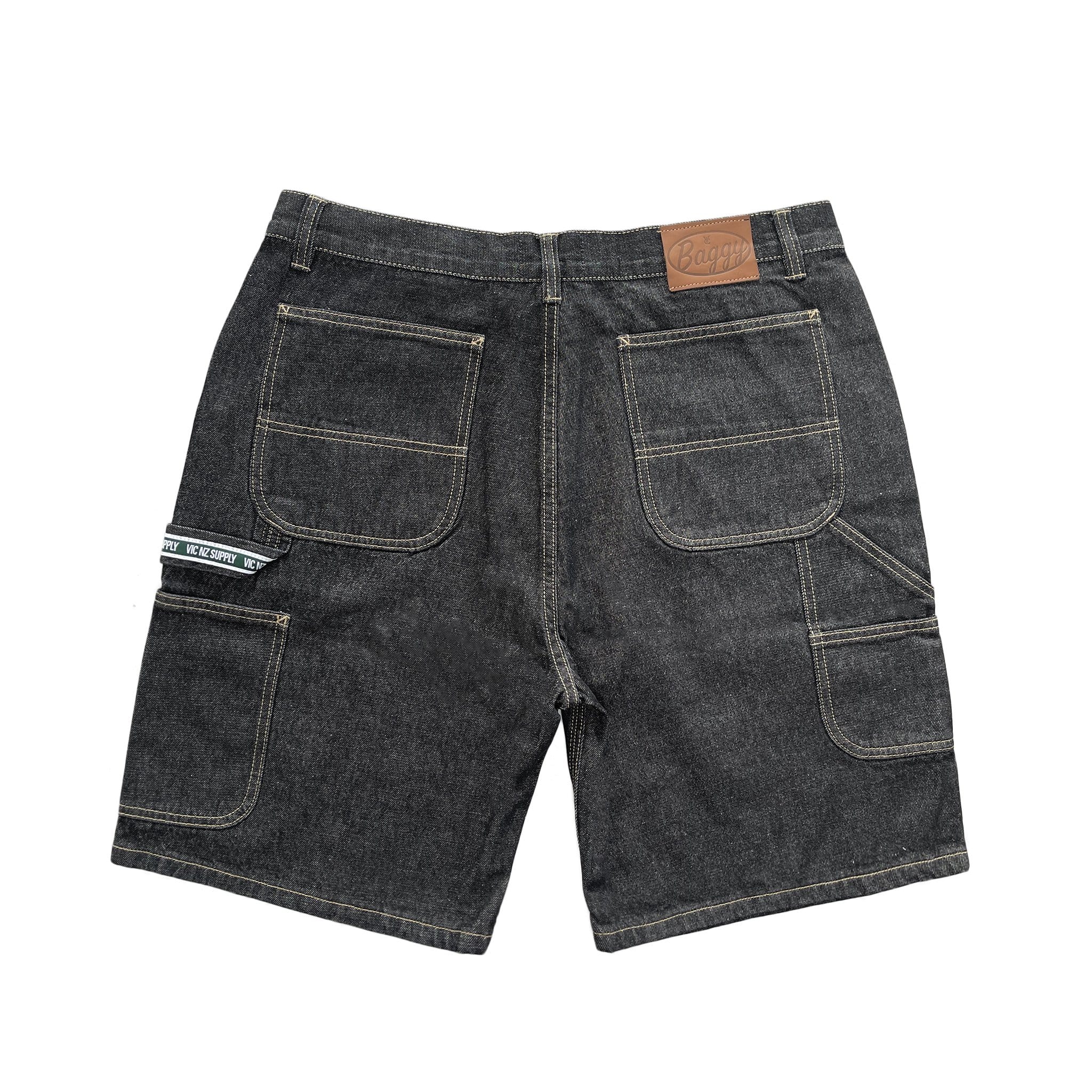 Premium quality carpenter denim jean shorts by New Zealand skate and streetwear clothing label VIC Apparel. Loose fit. Featuring utility pockets and triple needle contrast stitching with VIC label flag at the back right pocket. Classic vintage workwear style. 90s baggy jorts style