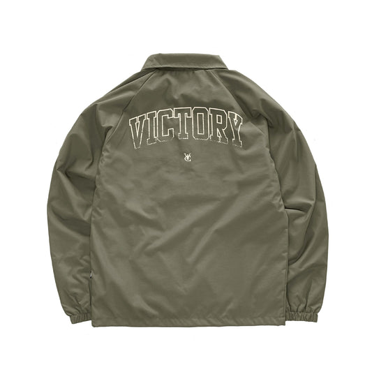 Premium quality sports showerproof coach jacket in black by New Zealand skate and streetwear clothing label VIC Apparel. Screen printed logos. 100% Oxford nylon matt finish, Regular fit, Lightweight microfibre Lining, Stash pocket inside the chest.
