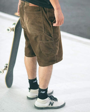 Premium quality corduroy carpenter shorts by New Zealand skate and streetwear clothing label VIC Apparel. Loose fit. Featuring utility pockets, a traditional hammer loop, and triple needle contrast stitching with VIC label flag at the back right pocket. The 80s & 90s Classic vintage workwear cord work shorts style.