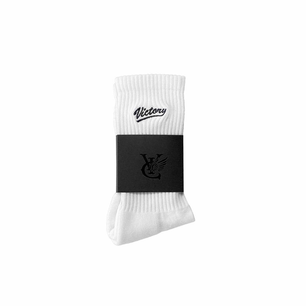 Cotton blend tube socks by New Zealand skate and streetwear clothing label VIC Apparel. Embroidered logo.