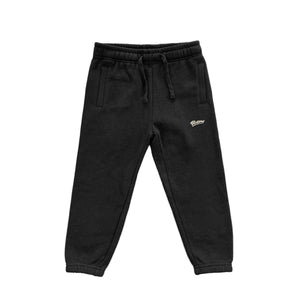Cozy mid-weight kids youth sweat track pants in black by New Zealand skate and streetwear clothing label VIC Apparel. American 90s vintage classic sportswear regular fit. Minimal simple design.
