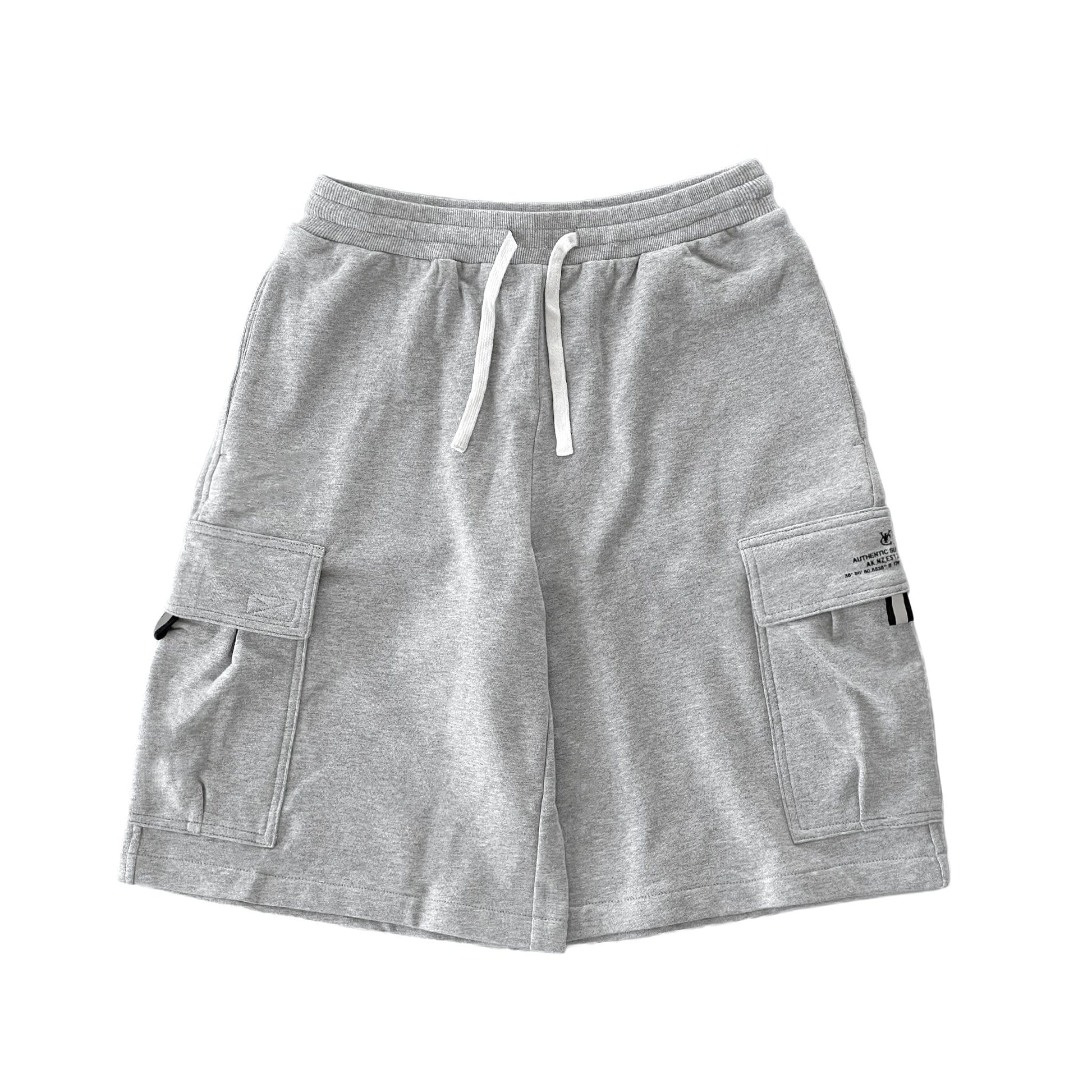 Heavyweight sweat cargo track shorts by New Zealand skate and streetwear clothing label VIC Apparel. Loose baggy fit. Screen printed logo. Reflective pull on cargo pocket flap. 